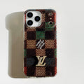 Multicolor fuzzy checked iPhone case with a raised monogram detail