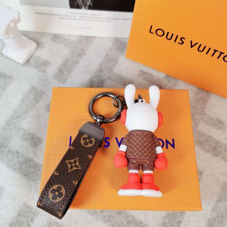 Rear view of red bunny keychain with upright white ears